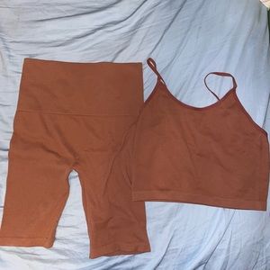Co ord two piece burnt orange stretchy crop top and biker shorts